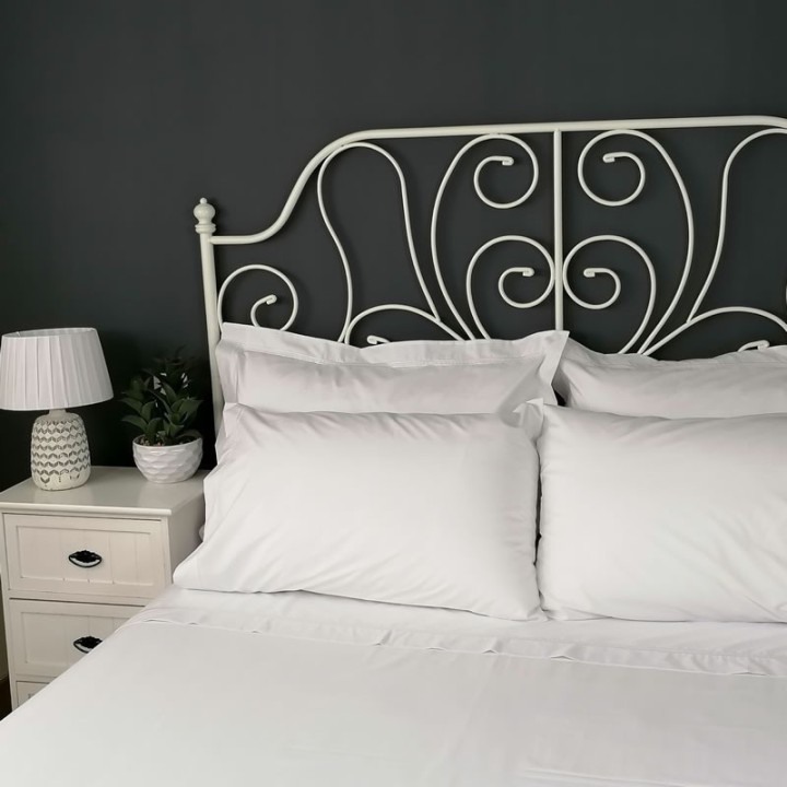 Flat sheet white trim Egyptian Cotton 200 Thread Count Percale Porto with side table